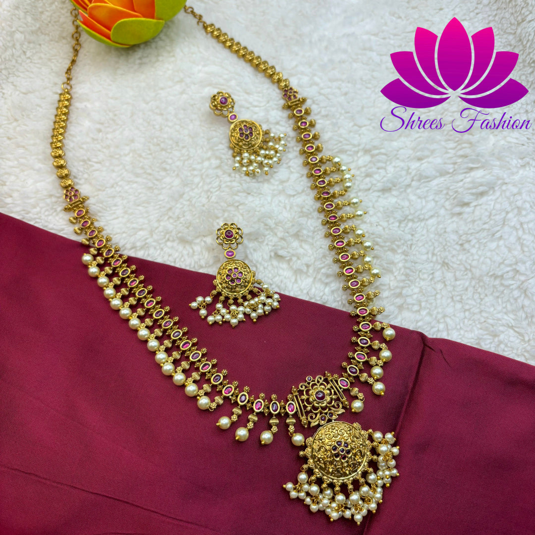 "Golden Elegance: Matte Gold Long Haram with Pearl Adornments and Pendant"