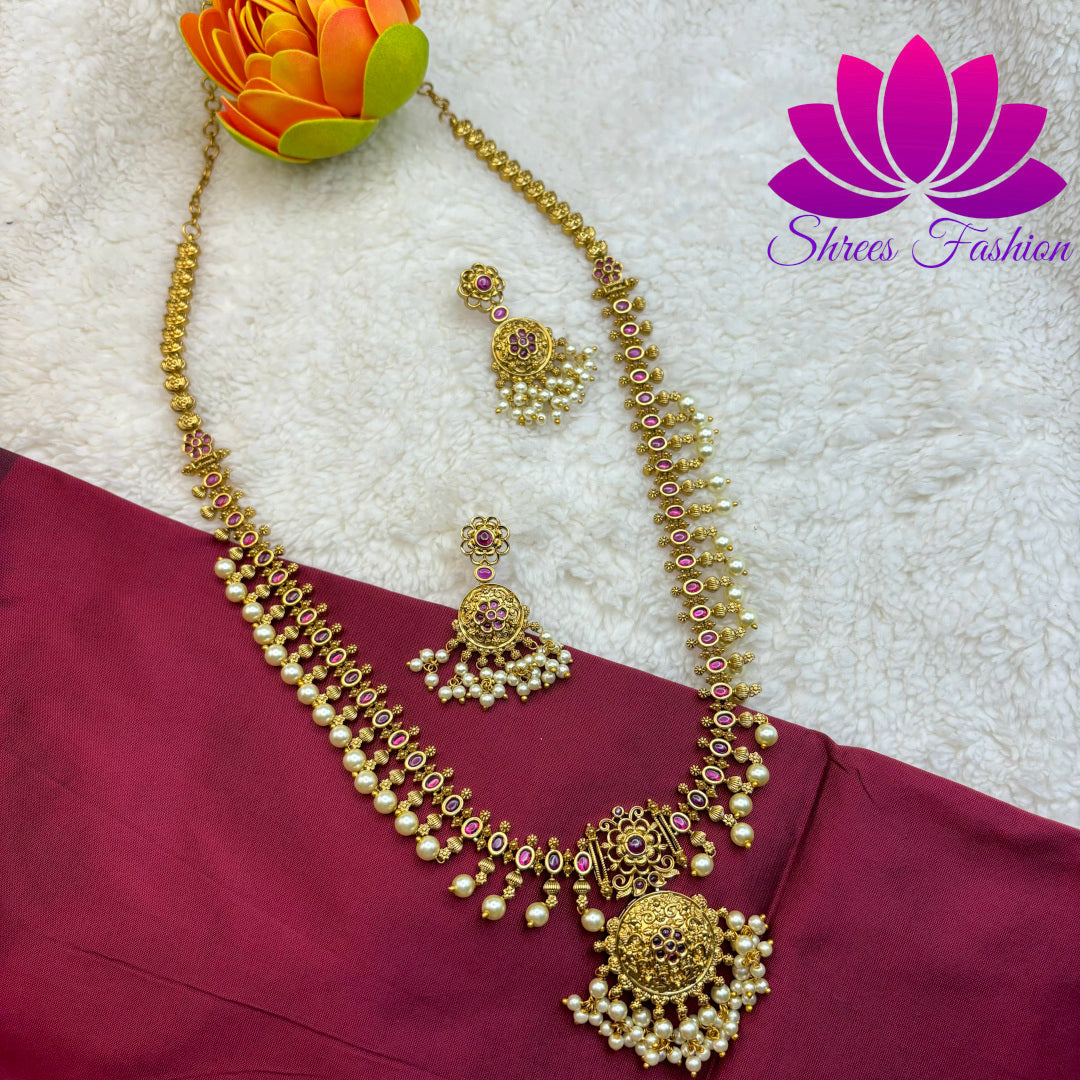 "Golden Elegance: Matte Gold Long Haram with Pearl Adornments and Pendant"