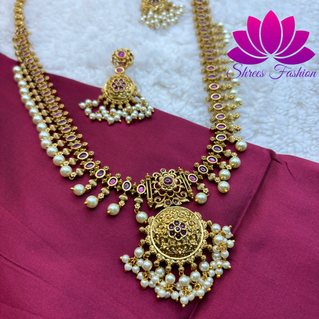 "Golden Elegance: Matte Gold Long Haram with Pearl Adornments and Pendant"