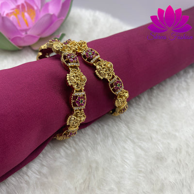 Harmonious Fusion: Flower and Temple Design Matte Finish Bangles