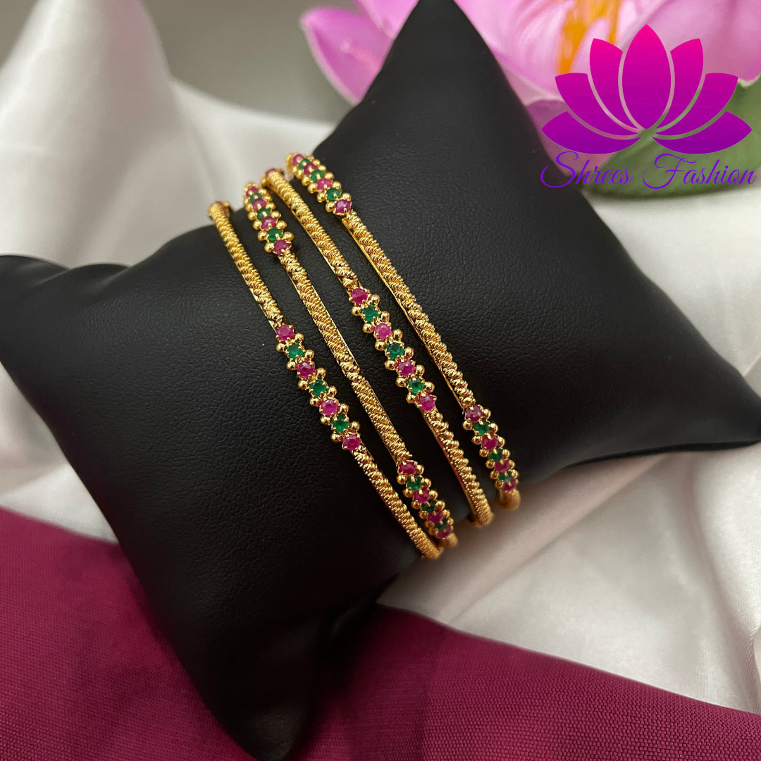 Radiant Simplicity: Shrees Fashion's Gold Finish Set of Four Thin Bangles - Shrees  Fashion Australia